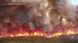 Raging Wildfires Burn Across Canada Sending Smoke Down to the US [upl. by Brander]