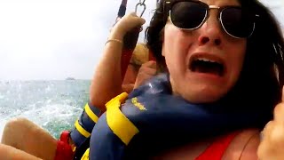 Vacationers Spot Sharks in Water While Parasailing [upl. by Annaitsirhc]