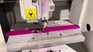 Engraving a wristband on a Gravograph M20 machine [upl. by Ecinreb]