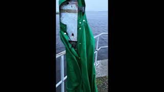 Green vintage raincape blowing in the wind [upl. by Ameer]