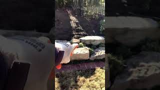 Cheap and effective retaining walls Use garden boulders landscapegardening erosion control [upl. by Witty]