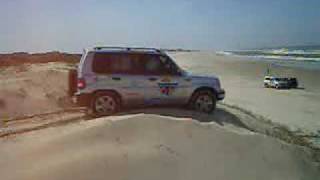 mitsubishi pajero io atolando na praia [upl. by Eneluqcaj]