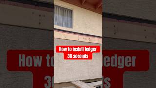 Installing wood ledger at stucco home construction framing deckbuilding [upl. by Eibmab]