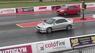 2002 Subaru Impreza WRX vs Ford Fiesta ST  14 Mile Drag Race [upl. by Calore267]