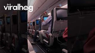 Airline Passenger Upset at Reclined Seat  ViralHog [upl. by Cris286]