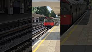 A Piccadilly Line train arriving at Sudbury Town with a service to Acton Town train [upl. by Bruno]