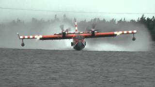 CL415 Canadair or Bombardier Water Bomber pick up and water drop [upl. by Aitnic]