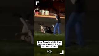 Good Samaritans hold down alleged drunk driver in Texas until officers arrive [upl. by Amjan159]