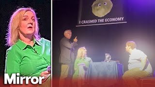 Liz Truss storms off stage after humiliating lettuce banner prank [upl. by Syhr]