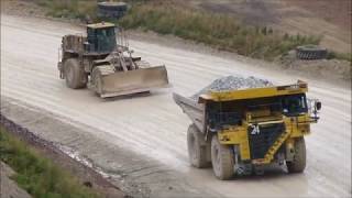 CAT Caterpillar 834K dozer and Komatsu HD785 on the way to overburden dump at Erzberg  Mount Iron [upl. by Atiuqram617]