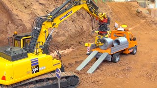 SPECIAL RC CONSTRUCTIONSITE MOMENTS RC KOMATSU PC 290 FUMOTEC LAY PIPES INTO THE GROUND [upl. by Otcefrep]