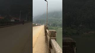 Foggy morning in Nong Khiaw Nong Khiaw bridge over looking Ou River Laos [upl. by Oinimreh617]