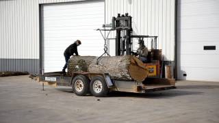 Husband amp Wife Unload Big Oak Logs For WoodMizer [upl. by Julita]