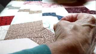 Hand Quilting  How to Bury a Knot [upl. by Aicinoid81]