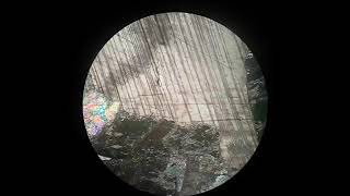 How Calcite mineral identify under Polarizing Microscope Video viral tranding youtube [upl. by Annav]