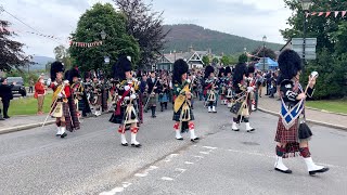 Massed Pipes and Drums marching to the 2022 Braemar Gathering Highland Games in Scotland [upl. by Ybanrab69]