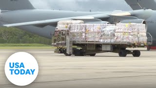 Tonga receives first aid supplies carrying fresh water generators  USA TODAY [upl. by Orteip]