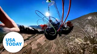 Entangled paraglider survives parachute failure  USA TODAY [upl. by Seugirdor724]