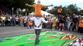 Nik Wallenda with woman on shoulders walks wire [upl. by Yerffoej431]