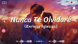 Enrique Iglesias  Nunca Te Olvidaré letra [upl. by Anoirb]