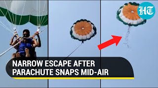 Watch Parachute rope snaps midair during parasailing in Diu couple crashes into sea [upl. by Annirak668]