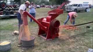 Farmall Cub Shelling corn with a no30 McCormick Sheller [upl. by Collins]