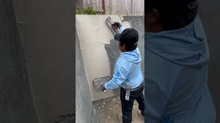 Adding the first layer of stucco construction mason stucco concrete stayathomemom [upl. by Alaric441]