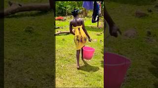 Doing laundry in the village 🇰🇪 ASMR shortsvillagelifeafricablackandwhitecouplelove [upl. by Eniak824]