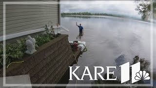 Waterville residents fight flooding with massive sandbag operation [upl. by Etnauj]