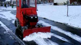 Wheel Horse pushing snow [upl. by Bibbye]