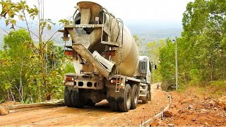 Hino 500 Ready mix cement truck Delivering pouring Concrete on Hill Road construction From Indonesia [upl. by Horatius]