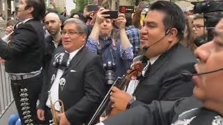 Mariachi band plays at protest of lawyer in racist rant video [upl. by Vanzant]