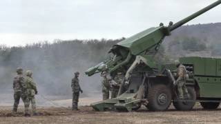 Danish troops firing CAESAR 8x8 selfpropelled artillery system [upl. by Keifer599]