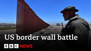 Biden approves new section of border wall as Mexico crossings rise  BBC News [upl. by Ahsinid652]