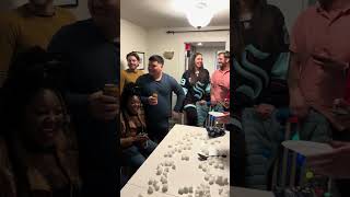 Family and friends are playing a cotton ball game for the holidays [upl. by Llert239]