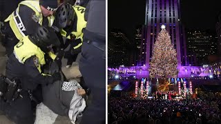 Protesters clash with police near the Rockefeller Center tree lighting [upl. by Swiercz902]