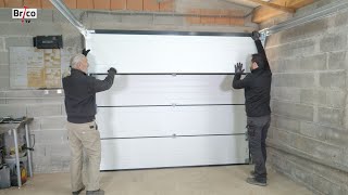 Installer une porte de garage sectionnelle  Tuto bricolage avec Robert [upl. by Charlet622]