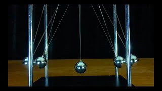 Newtons Cradle in Slow Motion  Make Science Fun [upl. by Aicirtan]