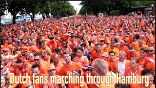 Dutch fans marching through Hamburg [upl. by Atinihs135]