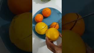 Slicing the oranges in half shortsfeed subscribe orangejuice fruitcutting fruitlover trending [upl. by Pitzer]