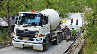 Ready Mix Cement Trucks Pouring Concrete On The Step Road Paving Construction [upl. by Garett224]