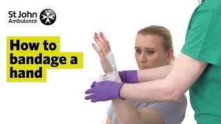 How to Bandage A Hand  First Aid Training  St John Ambulance [upl. by Backer]