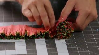 How to Wrap a Gift With Crepe Paper PomPoms [upl. by Akemyt412]