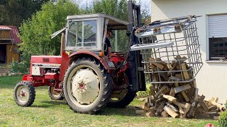 Brennnholz Gitterboxen mit Kistendrehgerät Hubmast und IHC 433 ausfahren und auskippen [upl. by Boehike]