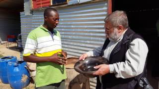 Tefo Emandulo near Witsieshoek explaining to Harold Goodwin about pottery [upl. by Gnirol794]