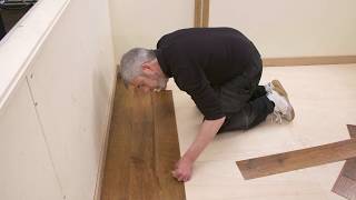 Karndean How To SeriesCutting and fitting a plank to a wall  Gluedown [upl. by Neelat]