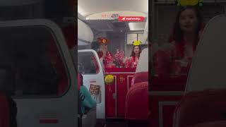 AirAsia stewards dressed up as ‘God of Wealth’ to sell CNY goodies on flight [upl. by Aicil46]