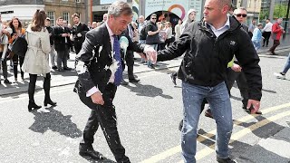 Nigel Farage doused in milkshake on the campaign trail [upl. by Uela]