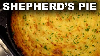 Shepherds Pie in a cast iron pan  lamb and peas filling cheesy potato topping [upl. by Neyrb]