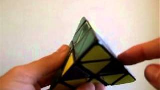 Como resolver o Pyraminx Meios avançado [upl. by Nylatsyrc]